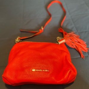 Orange Michael Kors crossbody